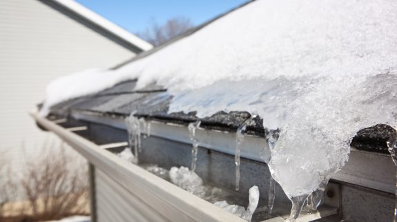 Ice on roof and gutters causing Ice dam, home insurance, property insurance, personal insurance