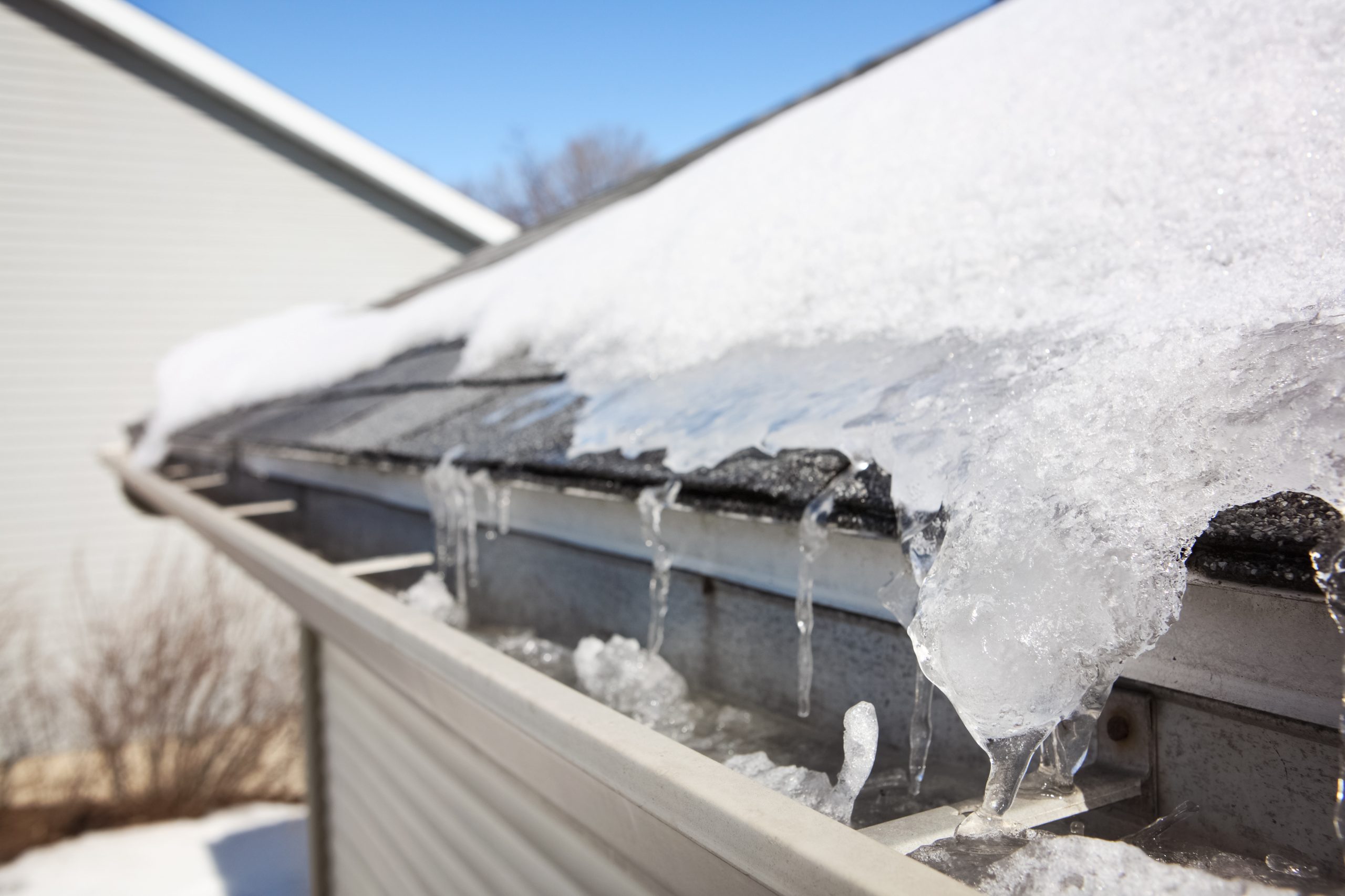 Ice on roof and gutters causing Ice dam, home insurance, property insurance, personal insurance