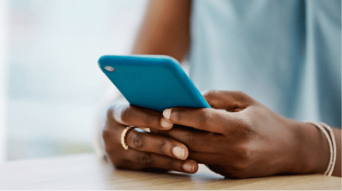 Examples of scam text messages on smartphone screen